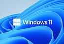 Windows-11-Logo vor dem blauen Bloom-Hintergrund